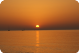 Zalazak suncu s pogledom na olupinu broda i jedrilicu photo: Zoran Pelikan